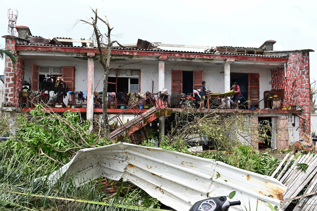 People survey the damage done by cyclone Gezani in Toamasina, Madagascar, Wednesday, Feb. 11, 2026. (AP Photo/Hery Nirina Rabary)