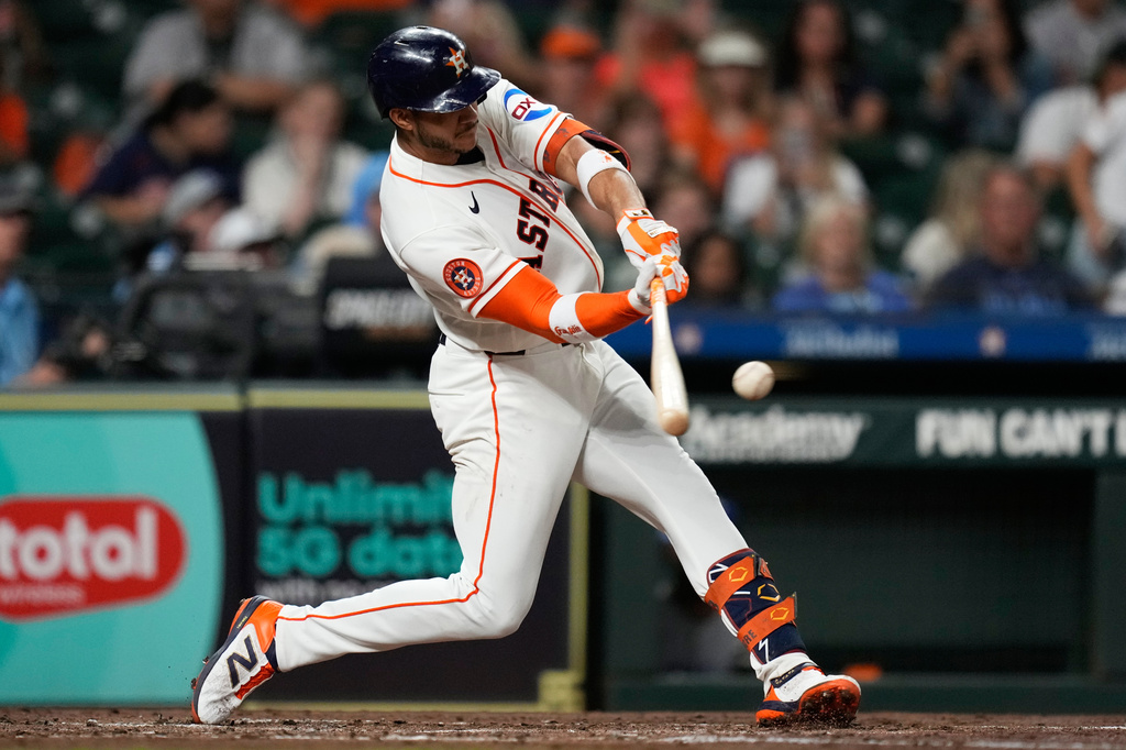 Houston Astros shortstop Jeremy Peña hits a home run during the third inning of a baseball game against the Kansas City Royals in Houston, Tuesday, Sept. 15, 2026. (AP Photo/Ashley Landis)