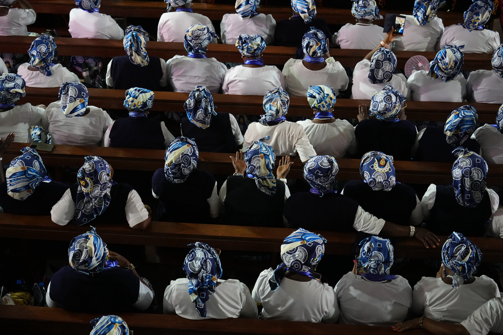 Faithful attend a meeting for peace, lead by Pope Leo XIV at Saint Joseph's Cathedral in Bamenda, Cameroon, with the local community Thursday, April 16, 2026, on the fourth day of his 11-day pastoral visit to Africa. (AP Photo/Andrew Medichini)