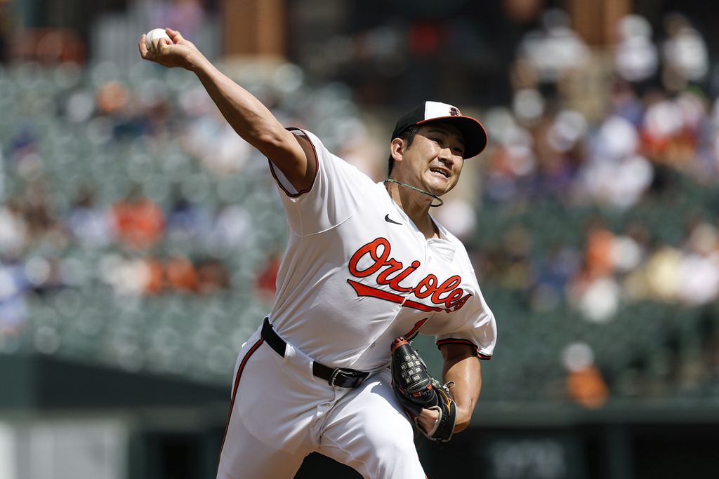 Baltimore Orioles pitcher Tomoyuki Sugano throws during the first inning of a baseball game against the Los Angeles Dodgers, Sunday, Sept. 7, 2025, in Baltimore. (AP Photo/Terrance Williams)