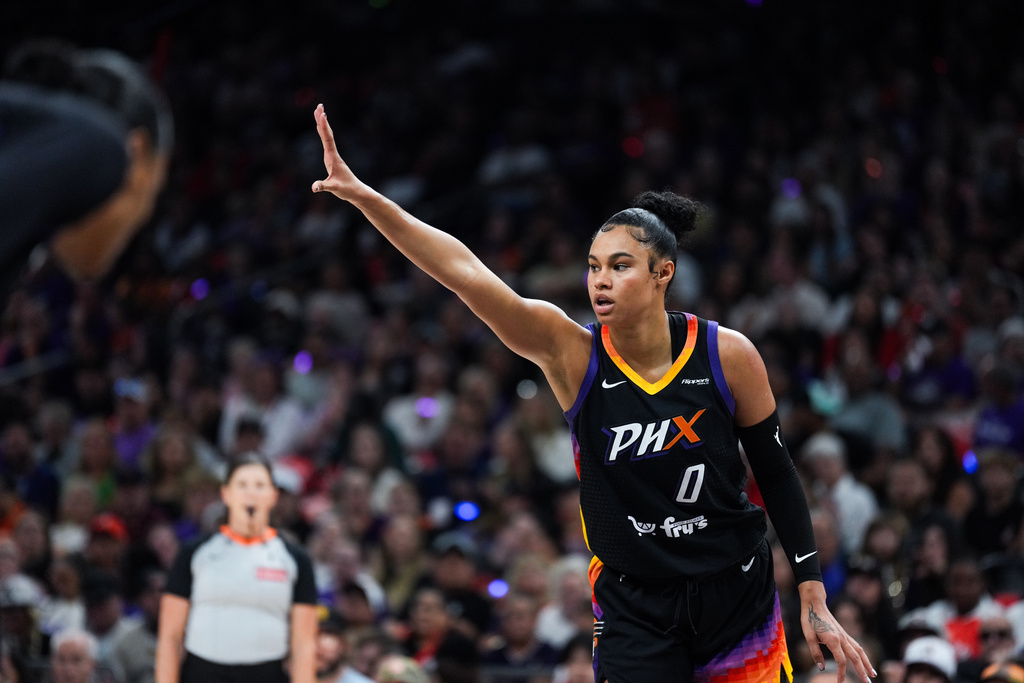 Phoenix Mercury forward Satou Sabally (0) puts her hand up during the first half of Game 4 of a WNBA basketball playoff semifinals series against the Minnesota Lynx, Sunday, Sept. 28, 2025, in Phoenix. (AP Photo/Samantha Chow)