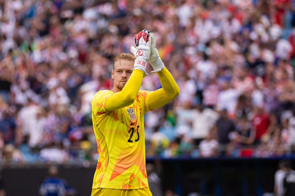 United States goalkeeper Chris Brady (25) acknowledges the fans after defeating Senegal in an international friendly soccer match Sunday, May 31, 2026, in Charlotte, N.C. (AP Photo/Scott Kinser)