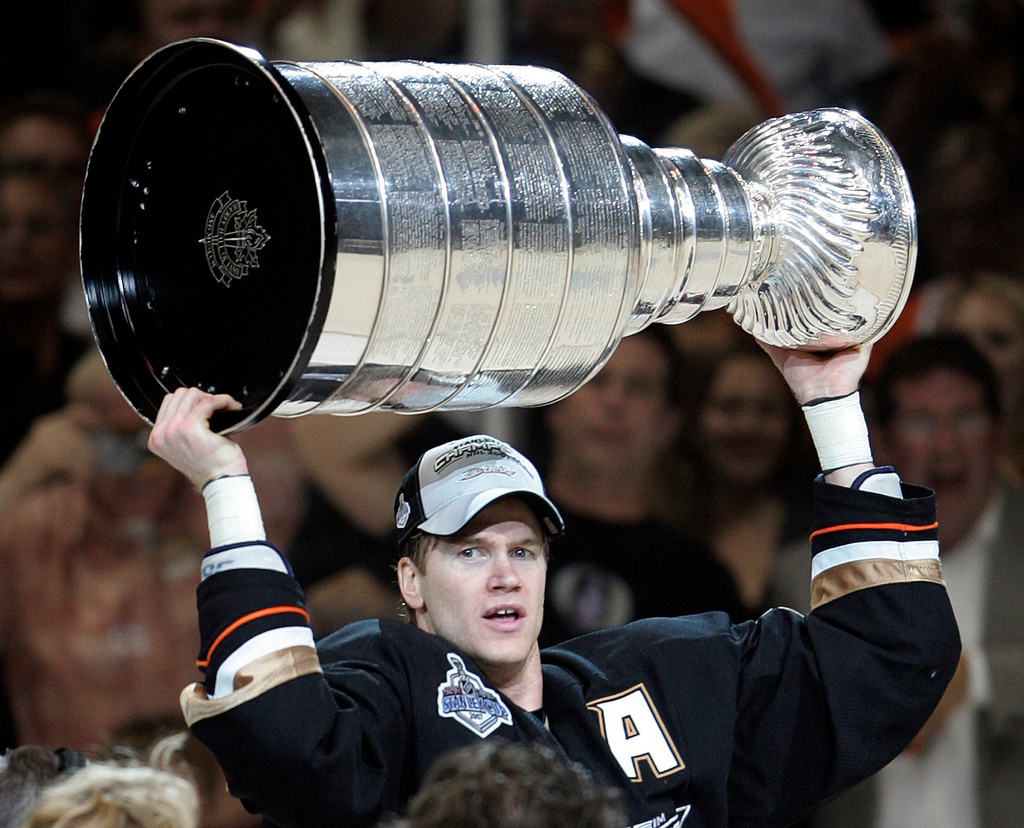 FILE - Anaheim Ducks Chris Pronger hoists the Stanley Cup after defeating the Ottawa Senators in Game 5 of the NHL Stanley Cup hockey finals in Anaheim, Calif., June 6, 2007. (Paul Chiasson/The Canadian Press via AP, File)