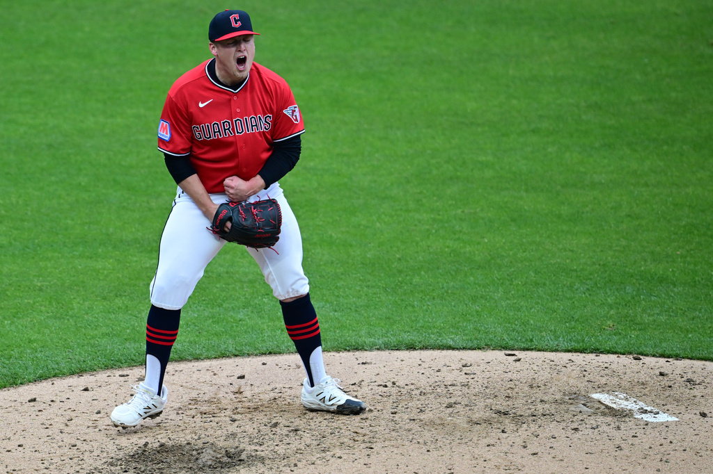 Cleveland Guardians starting pitcher Parker Messick reacts after striking out Chicago Cubs' Alex Bregman in the fifth inning in the second baseball game of a doubleheader, Sunday, April 5, 2026, in Cleveland. (AP Photo/David Dermer)