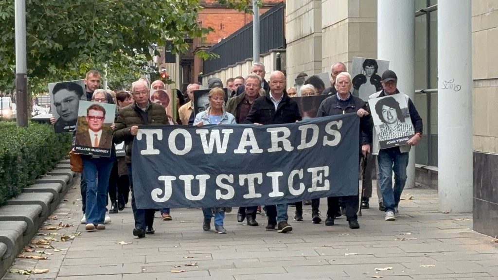 Families of James Wray and William McKinney who were shot dead during the events of Bloody Sunday arrive at Belfast Crown Court as the trial of a former paratrooper accused of their murders during the events of Bloody Sunday in Londonderry in 1972 on Thursday, Oct. 16, 2025. (Rebecca Black/PA via AP)