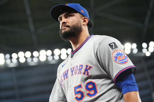 New York Mets starting pitcher Sean Manaea walks to the dugout before a baseball game against the Miami Marlins, Sunday, Sept. 28, 2025, in Miami. (AP Photo/Lynne Sladky) New York Mets starting pitcher Sean Manaea walks to the dugout before a baseball game against the Miami Marlins, Sunday, Sept. 28, 2025, in Miami. (AP Photo/Lynne Sladky)