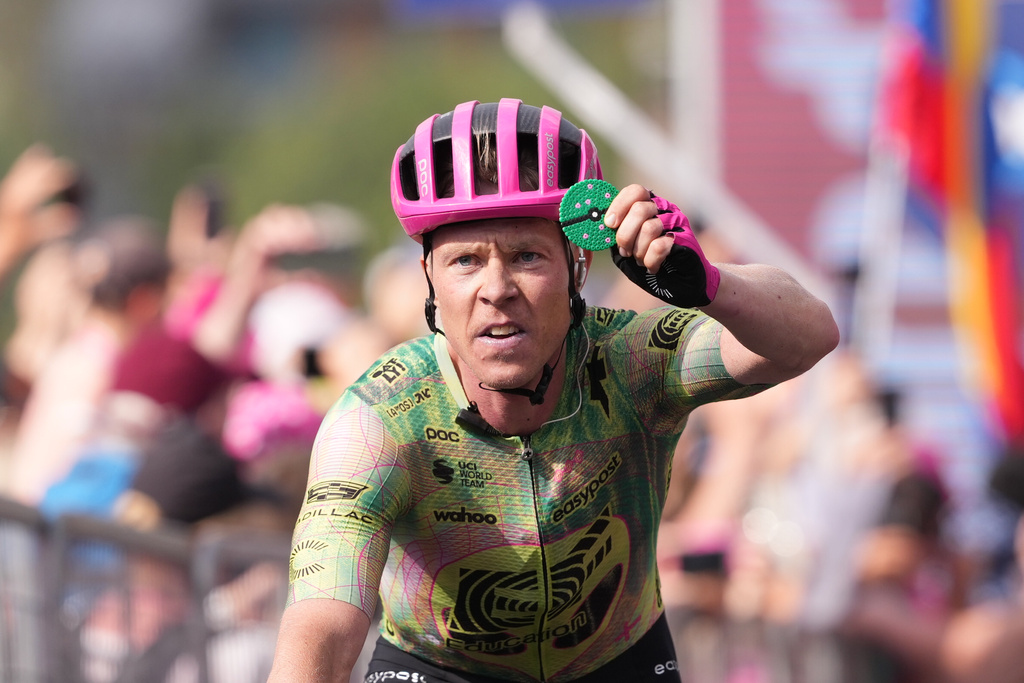Denmark's Michael Valgren celebrates winning the 17th stage of the Giro d'Italia cycling race from Cassano D'Adda to Andalo, Italy, Wednesday, May 27, 2026. (Gianmattia D'Albertoi/LaPresse via AP)