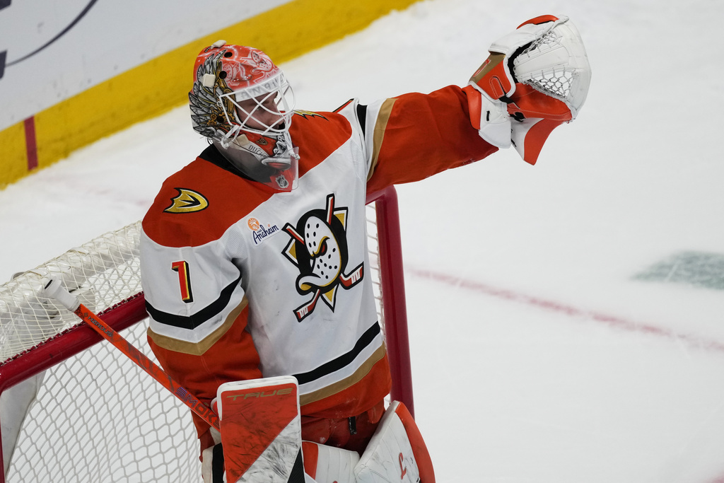 Anaheim Ducks goaltender Lukas Dostal celebrates after a shootout victory over the Colorado Avalanche in an NHL hockey game Wednesday, Jan. 21, 2026, in Denver. (AP Photo/David Zalubowski)