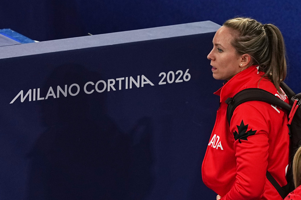 Canada's Rachel Homan leaves following a women's curling semifinal match against Sweden at the 2026 Winter Olympics, in Cortina d'Ampezzo, Italy, Friday, Feb. 20, 2026. (AP Photo/Fatima Shbair)