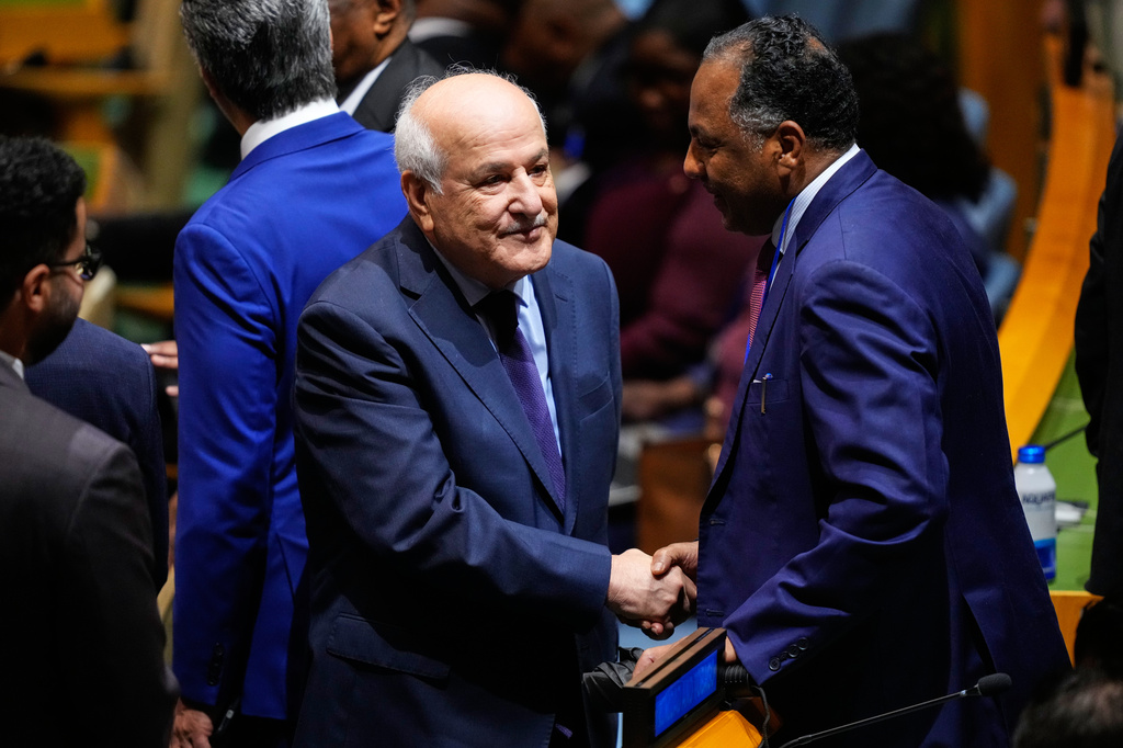 Palestinian Ambassador to the United Nations Riyad Mansour, left, arrives ahead of the 81st session of the United Nations General Assembly at United Nations headquarters, Tuesday, Sept. 22, 2026. (AP Photo/Yuki Iwamura)