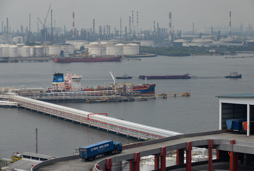 A truck pulls into a parking garage overlooking Jurong Island in Singapore on Oct. 6, 2025. (AP Photo/Anton L. Delgado) A truck pulls into a parking garage overlooking Jurong Island in Singapore on Oct. 6, 2025. (AP Photo/Anton L. Delgado)
