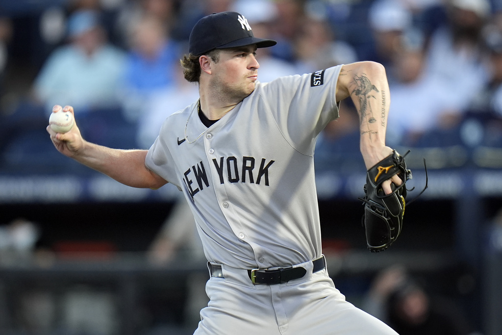 New York Yankees pitcher Cam Schlittler delivers to the Tampa Bay Rays during the first inning of a baseball game Wednesday, Aug. 20, 2025, in Tampa, Fla. (AP Photo/Chris O'Meara)
