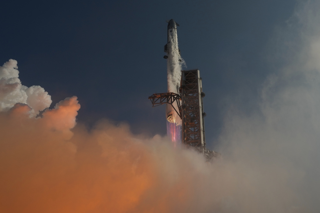 SpaceX's mega rocket Starship makes a test flight from Starbase, Texas, Friday, May 22, 2026. (AP Photo/Eric Gay)