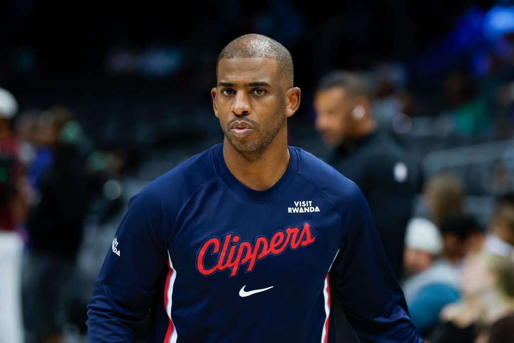 Los Angeles Clippers guard Chris Paul warms up before of an NBA basketball game against the Charlotte Hornets in Charlotte, N.C., Saturday, Nov. 22, 2025. (AP Photo/Nell Redmond)