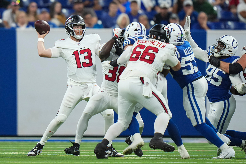 Atlanta Falcons quarterback Cooper Rush (13) throws against the Indianapolis Colts during the first half of an NFL football game in Indianapolis, Saturday, Aug. 22, 2026. (AP Photo/AJ Mast)