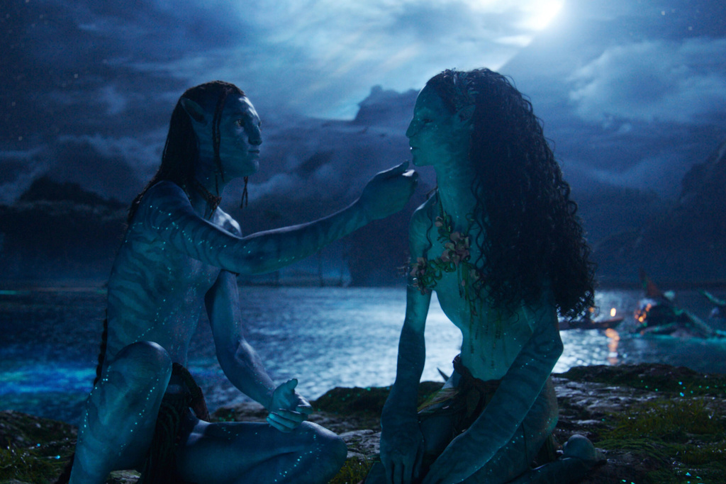 This image released by Disney shows Lo'ak, played by Britain Dalton, left, and Tsireya, played by Bailey Bass in a scene from "Avatar: Fire and Ash." (20th Century Studios/Disney via AP)