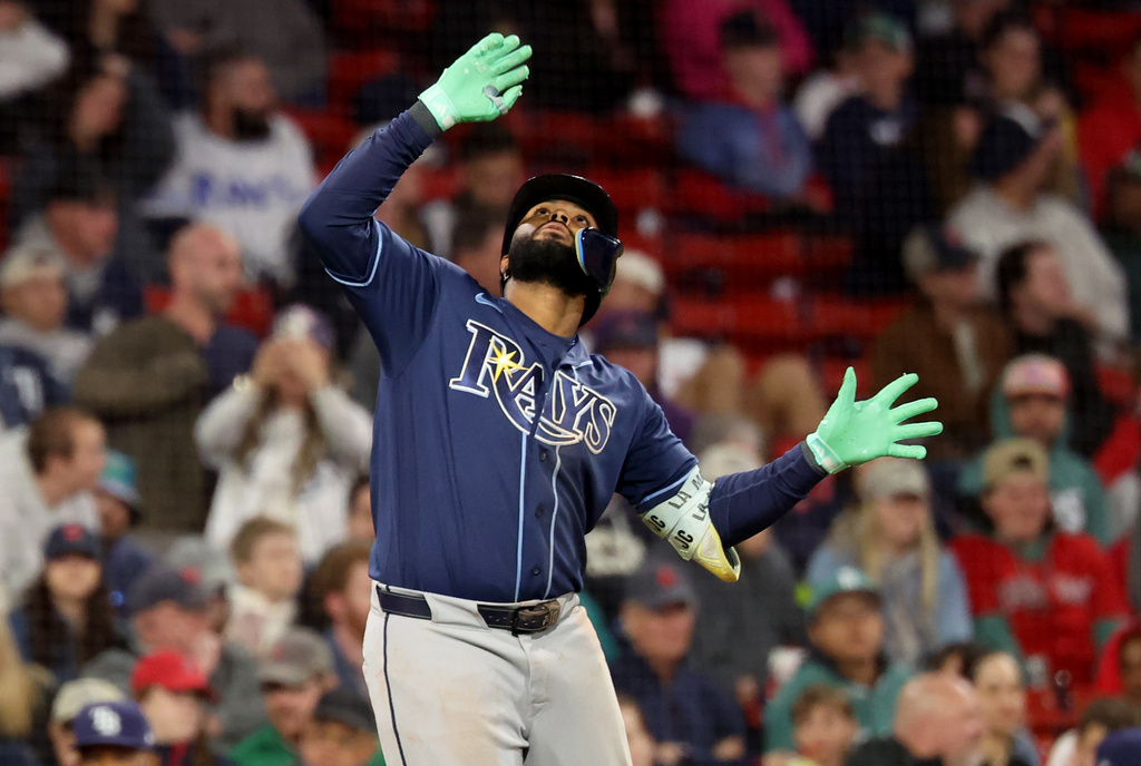 Tampa Bay Rays' Junior Caminero gestures after hitting two run home run during the ninth inning of a baseball game against the Boston Red Sox, Thursday, May 7, 2026, in Boston. (AP Photo/Mark Stockwell)