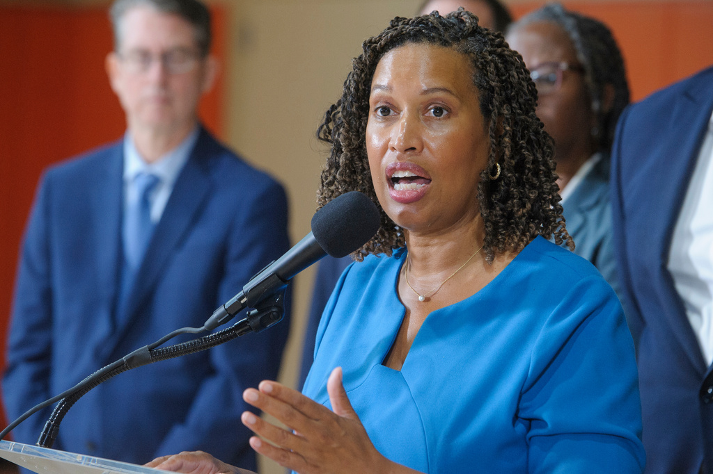 District of Columbia Mayor Muriel Bowser fields questions from reporters following a ribbon cutting ceremony for Stoddert Elementary School's new building addition in Washington, Monday, Aug. 18, 2025. (AP Photo/Rod Lamkey, Jr.)