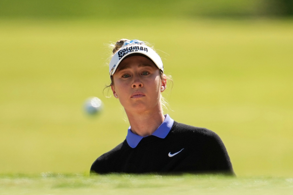 Nelly Korda plays a shot on the 16th hole during the first round of the Queen City Championship LPGA golf tournament at Maketewah Country Club, Thursday, May 14, 2026, in Cincinnati. (AP Photo/Jeff Dean)
