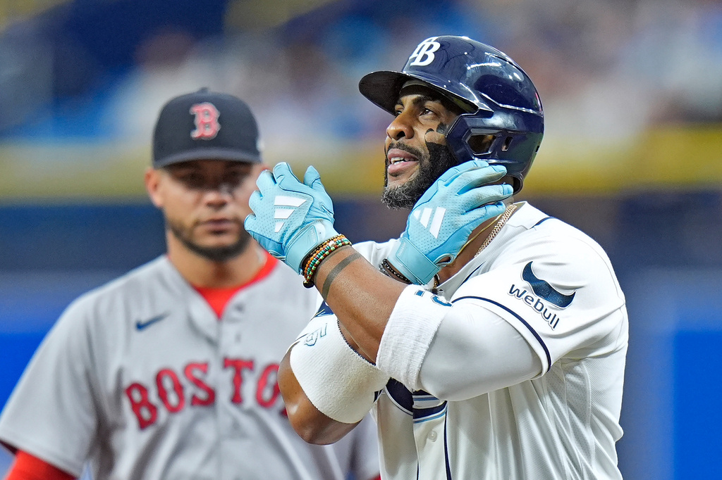 Tampa Bay Rays' Yandy Díaz celebrates after hitting a single off Boston Red Sox pitcher Payton Tolle during the first inning of a baseball game Tuesday, June 9, 2026, in St. Petersburg, Fla. (AP Photo/Chris O'Meara)