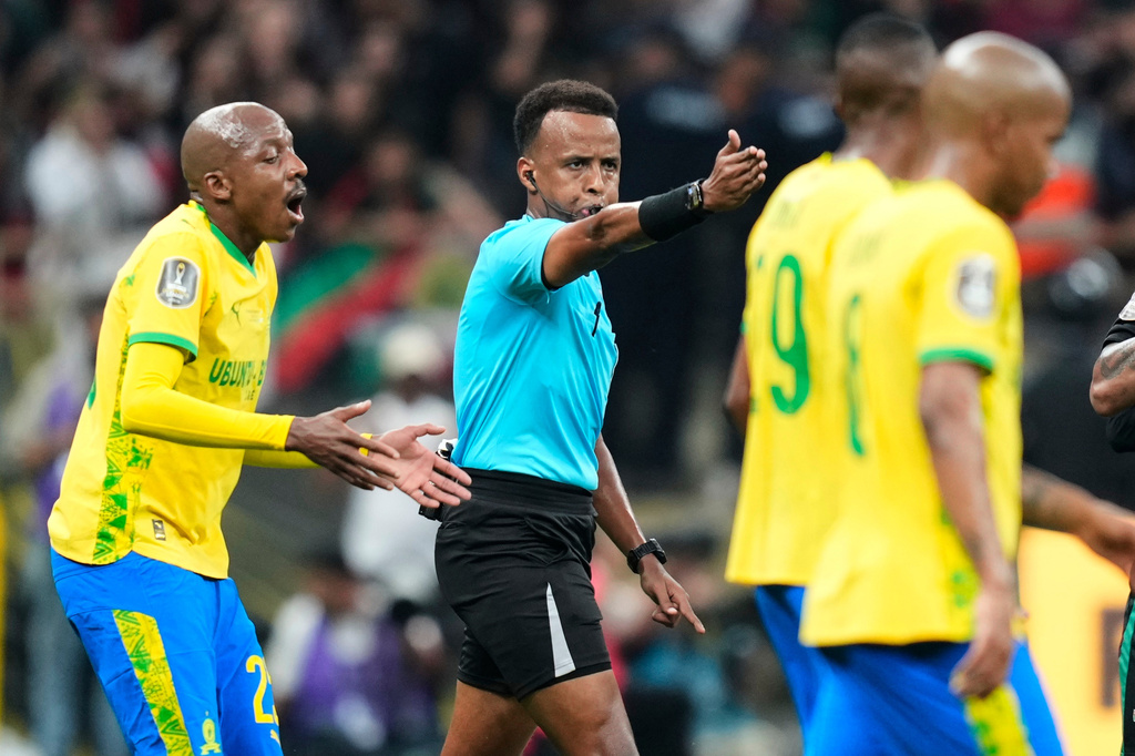 FILE - Referee Omar Artan, center, signals a penalty during the CAF Champions League final soccer match between AS FAR Rabat and Mamelodi Sundowns, in Rabat, Morocco, Sunday, May 24, 2026. (AP Photo/Mosa'ab Elshamy, File)