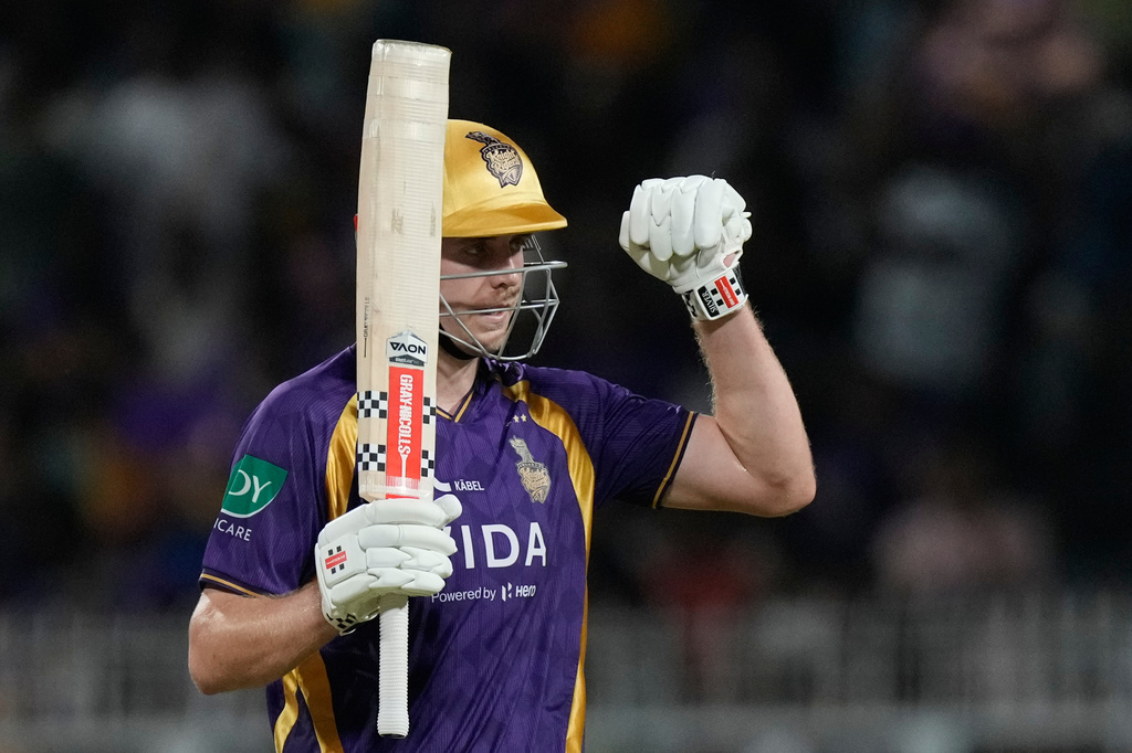Kolkata Knight Riders' Cameron Green celebrates his fifty runs during the Indian Premier League cricket match between Gujarat Titans and Kolkata Knight Riders, in Kolkata , India, Saturday, May 16, 2026. (AP Photo/Bikas Das)
