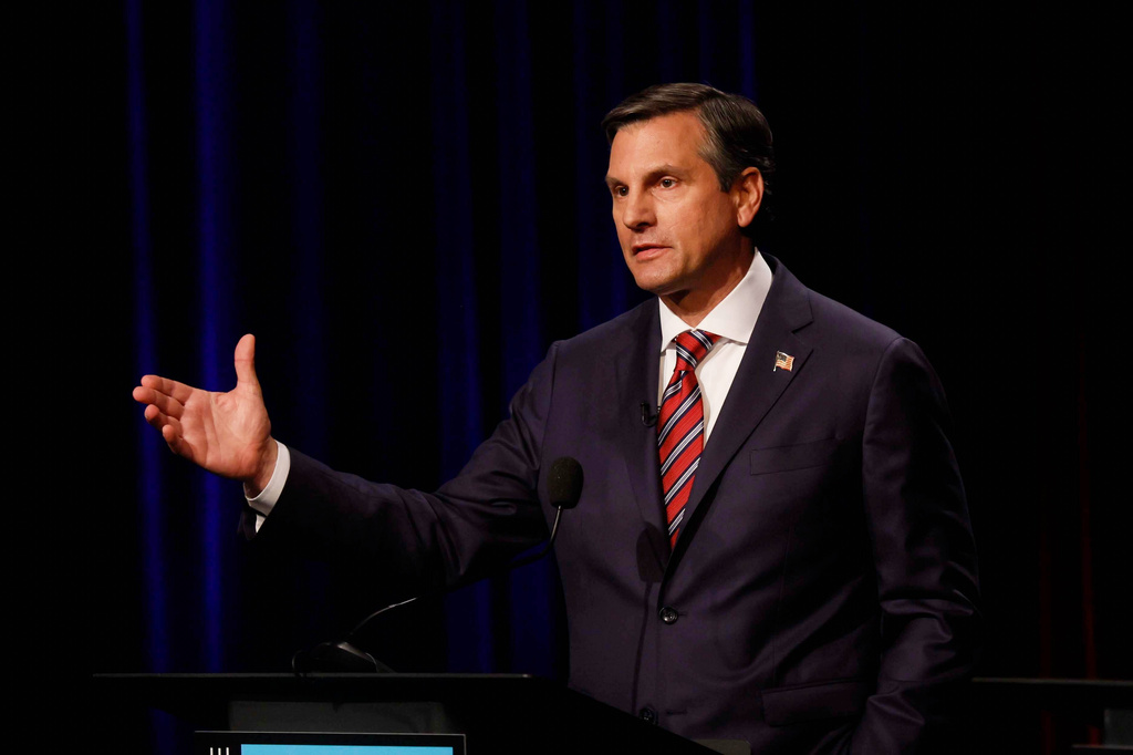 Former football coach Derek Dooley, a Republican candidate for the U.S. Senate, responds to a question at the Atlanta Press Club Loudermilk-Young primary election debate for the U.S. Senate at Georgia Public Broadcasting, Sunday, April 26, 2026, in Midtown, Atlanta. (Miguel Martinez/Atlanta Journal-Constitution via AP)