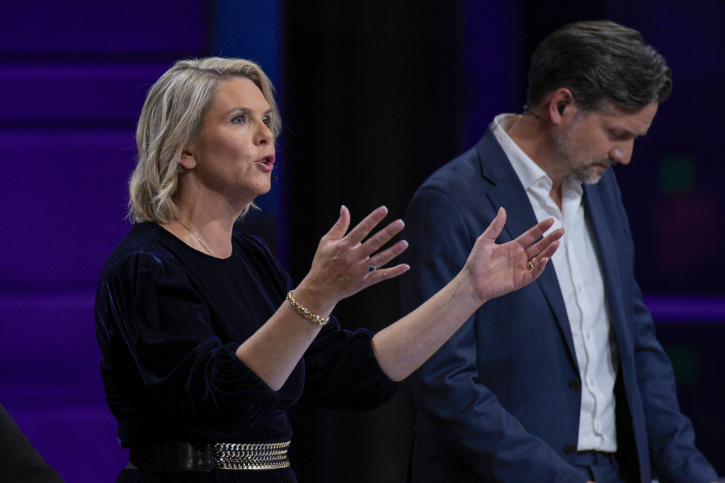 Sylvi Listhaug chairwoman of Norway's Frp party, left, and Dag-Inge Ulstein, right, chairman of Norway's KrF party during a tv debate in Oslo, Norway, Tuesday, Sept. 2, 2025. (Stian Lysberg Solum/NTB Scanpix via AP)