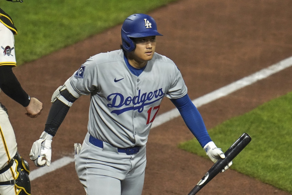 Los Angeles Dodgers' Shohei Ohtani walks back to the dugout after striking out against Pittsburgh Pirates pitcher Dennis Santana to end the baseball game in Pittsburgh, Wednesday, Sept. 3, 2025. (AP Photo/Gene J. Puskar)