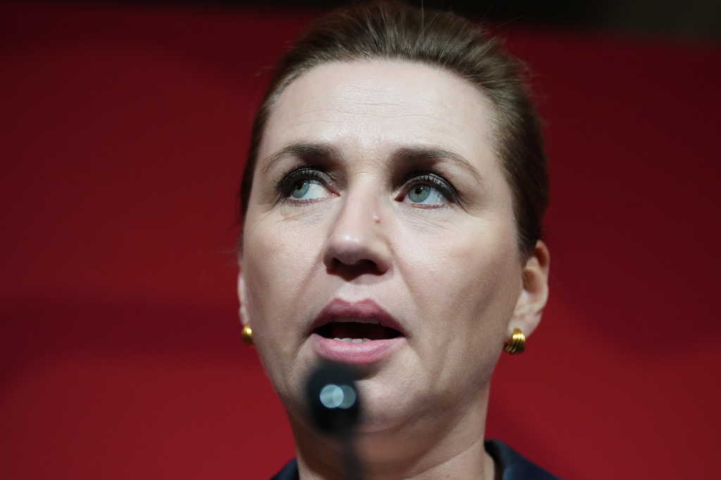Danish Prime Minister Mette Frederiksen speaks to members of her Social Democratic Party in the Danish Parliament in Copenhagen, Denmark, after the General Election on Tuesday, March 24, 2026. (AP Photo/Sergei Grits)