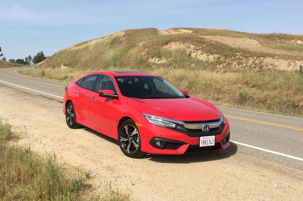 This photo provided by Honda shows the 2016 Civic, a longtime popular choice for a small sedan that offers peppy acceleration and solid fuel economy as well as solid construction. Aim to find a 2016 Civic, the year it received a redesign and a new optional turbocharged engine. (Courtesy of Edmunds via AP)
