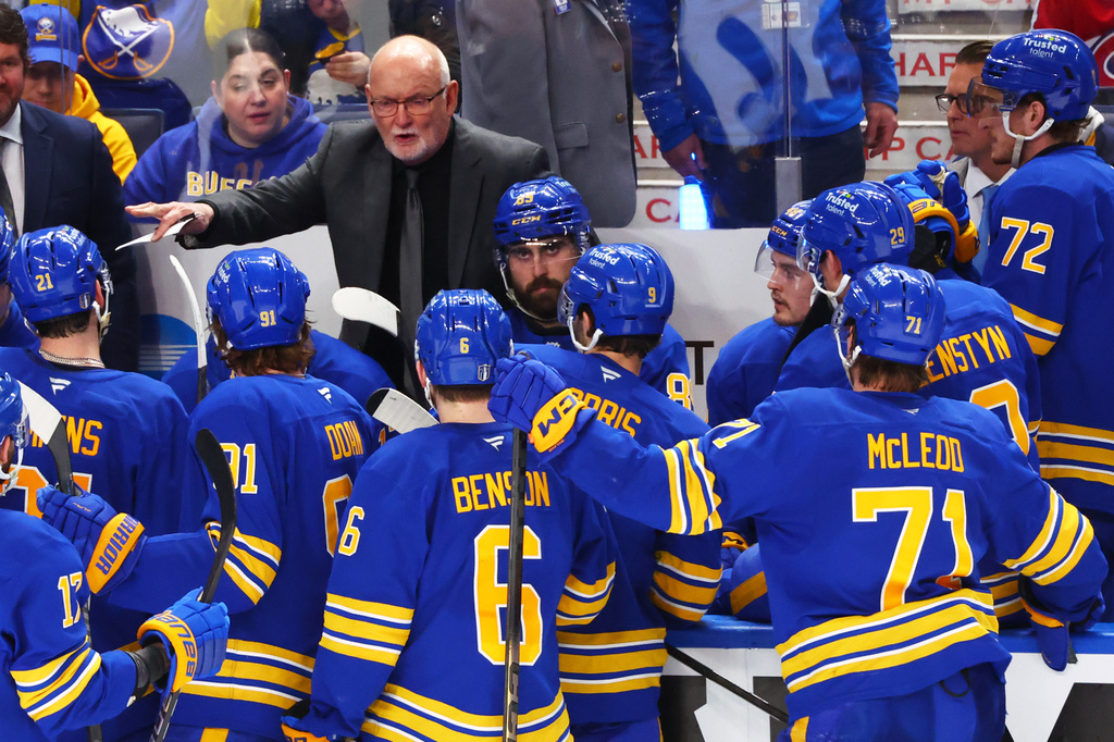 Buffalo Sabres head coach Lindy Ruff speaks with team during the third period in Game 1 of a second-round NHL hockey Stanley Cup playoff series against the Montreal Canadiens Wednesday, May 6, 2026, in Buffalo, N.Y. (AP Photo/Jeffrey T. Barnes)