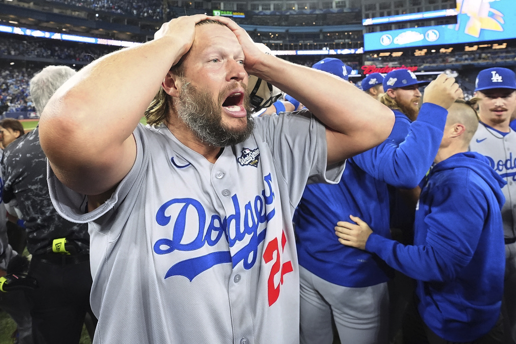 Los Angeles Dodgers pitcher Clayton Kershaw celebrates after the Dodgers defeated the Toronto Blue Jays in Game 7 of baseball's World Series, Sunday, Nov. 2, 2025, in Toronto. (Frank Gunn/The Canadian Press via AP)