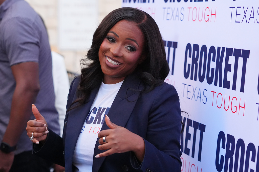 Supporters of primary candidate for U.S. Senate Rep. Jasmine Crockett, D-Texas, smiles at supporters during a campaign event in Richardson, Texas, Thursday, Feb. 19, 2026. (AP Photo/LM Otero)