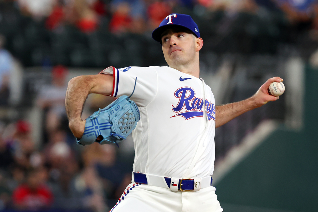 Texas Rangers pitcher Cody Bradford delivers a pitch against the San Francisco Giants in the first inning of a baseball game in Arlington, Texas, Wednesday, Aug. 5, 2026. (AP Photo/ Richard W. Rodriguez)