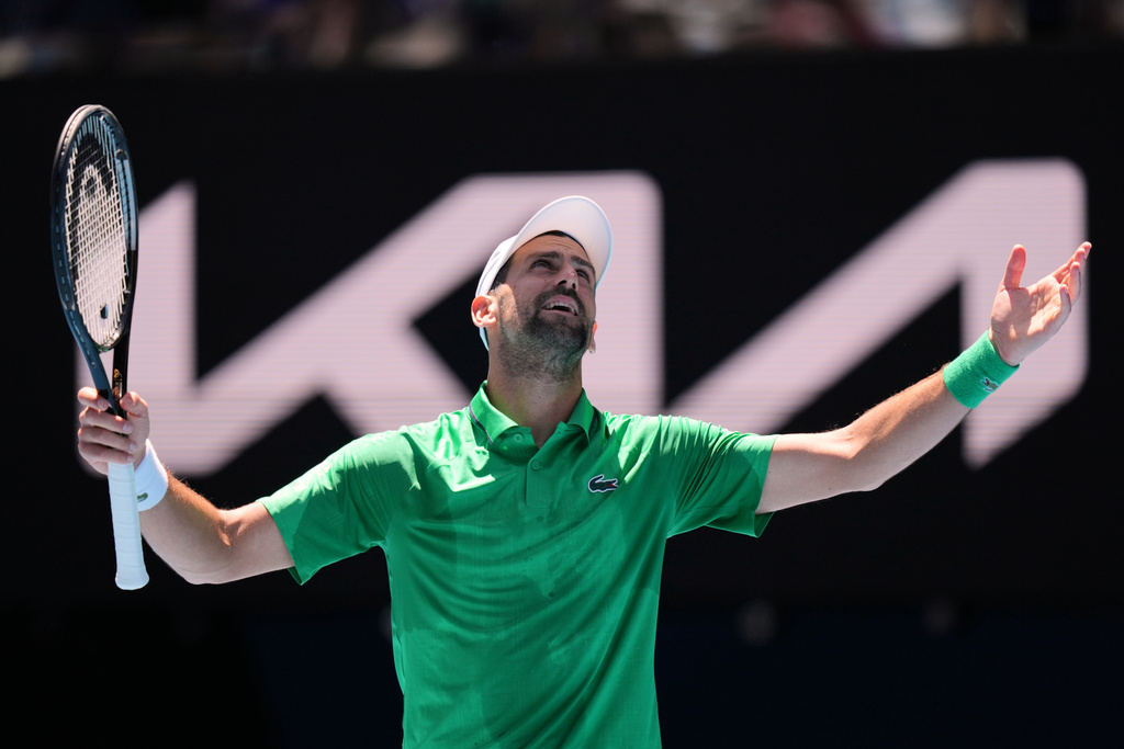Novak Djokovic of Serbia reacts during his second round match against Francesco Maestrelli of Italy at the Australian Open tennis championship in Melbourne, Australia, Thursday, Jan. 22, 2026. (AP Photo/Aaron Favila)