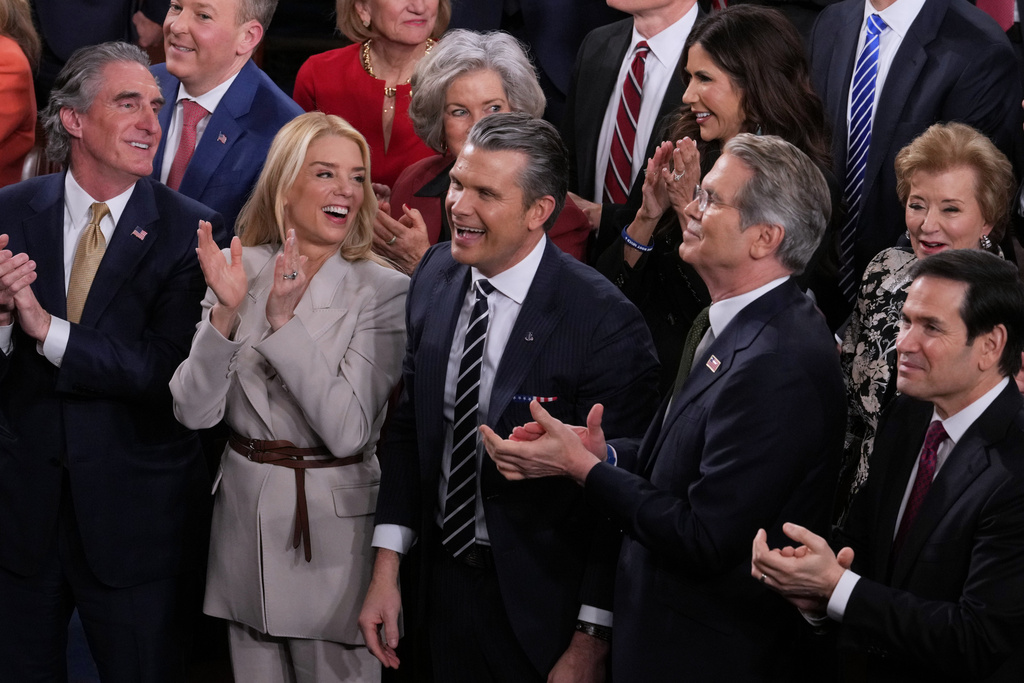 Cabinet members clap as President Donald Trump gives his State of the Union address to a joint session of Congress, at the Capitol in Washington, Tuesday, Feb. 24, 2026. (AP Photo/J. Scott Applewhite)