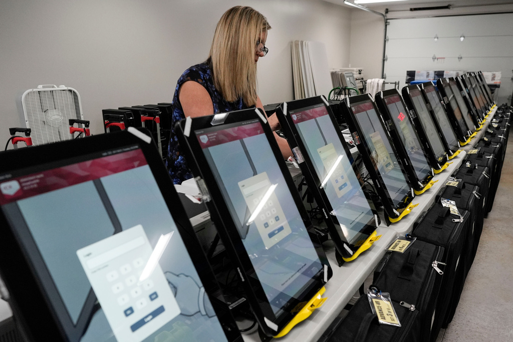 FILE - Voting machines are seen at the Bartow County Election office, Jan. 25, 2024, in Cartersville, Ga. (AP Photo/Mike Stewart, File)