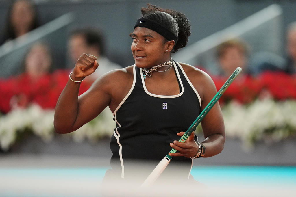 Hailey Baptiste, of the United States, celebrates a point during her match against Aryna Sabalenka, of Belarus, at the Madrid Open tennis tournament in Madrid, Tuesday, April 28, 2026. (AP Photo/Manu Fernandez)