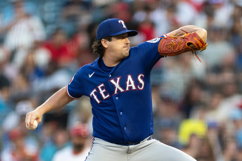 Texas Rangers starting pitcher Cal Quantrill works against a Los Angeles Angels batter in the first inning of a baseball game Wednesday, Aug. 12, 2026, in Anaheim, Calif. (AP Photo/Karl Anderson)