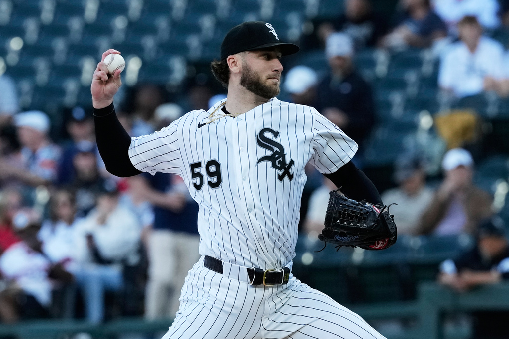 Chicago White Sox starting pitcher Sean Burke throws against the Cleveland Guardians during the first inning of a baseball game in Chicago, Tuesday, June 23, 2026. (AP Photo/Nam Y. Huh)