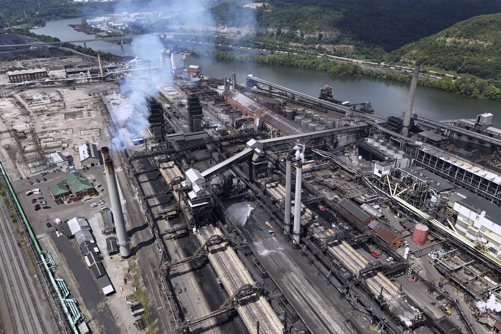 Video shows steel workers scrambling into wreckage left by explosion…