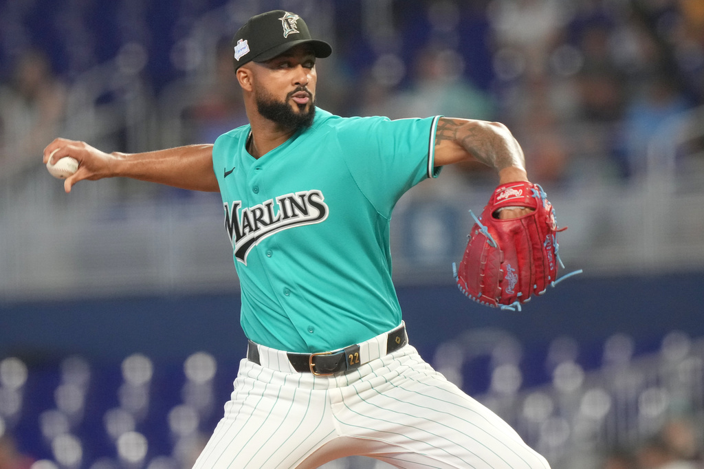 Miami Marlins starting pitcher Sandy Alcantara (22) aims a pitch during the first inning of a baseball game against the Tampa Bay Rays Sunday, June 7, 2026, in Miami. (AP Photo/Marta Lavandier)