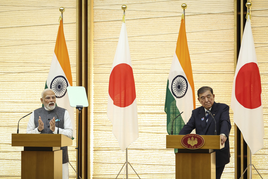 India's Prime Minister Narendra Modi, left, and Japan's Prime Minister Shigeru Ishiba hold a joint press conference in Tokyo, Japan, Aug. 29, 2025. (Takashi Aoyama/Pool Photo via AP)
