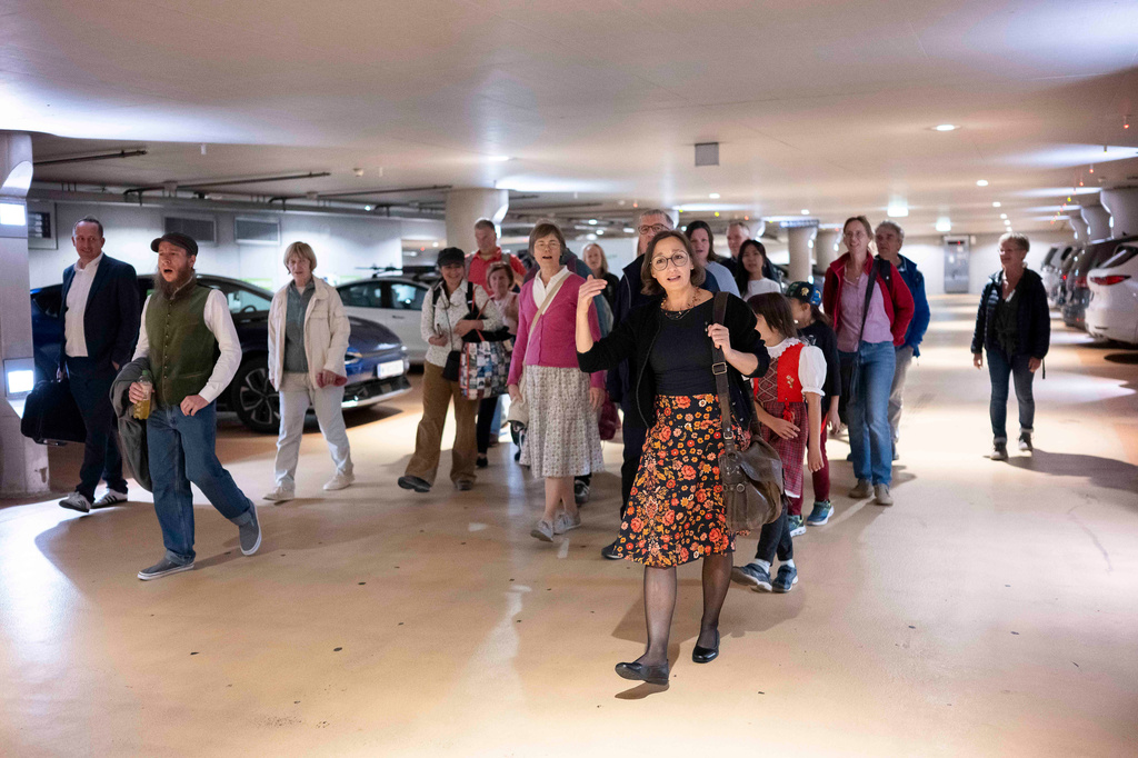 People yodel during a public event in an underground garage in Graz, Austria, on Wednesday, Sept. 23, 2026. (AP Photo/Denes Erdos)