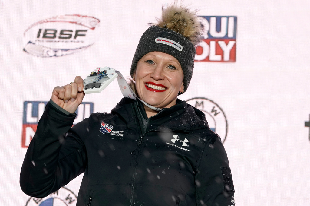 FILE - First placed Kaillie Humphries of United States celebrates during award ceremony of the of the Women's Monobob World Cup race in Sigulda, Latvia, Saturday, Feb. 18, 2023. (AP Photo/Oksana Dzadan, FILE)