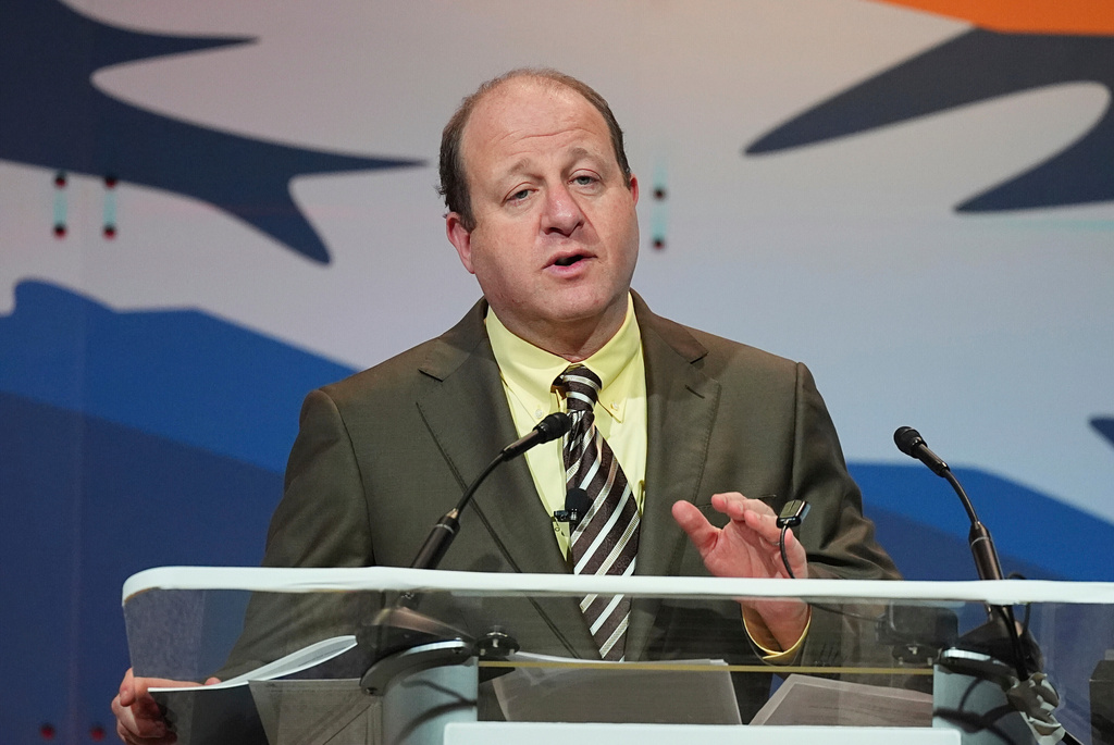 FILE - Colorado Gov. Jared Polis speaks to the National Governors Association at the Broadmoor Hotel in Colorado Springs, Colo., July 25, 2025. (AP Photo/David Zalubowski, File)