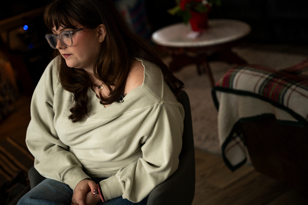 Kate poses for a portrait in her apartment in Kentucky, Wednesday, Dec. 10, 2025. (AP Photo/Michael Swensen)