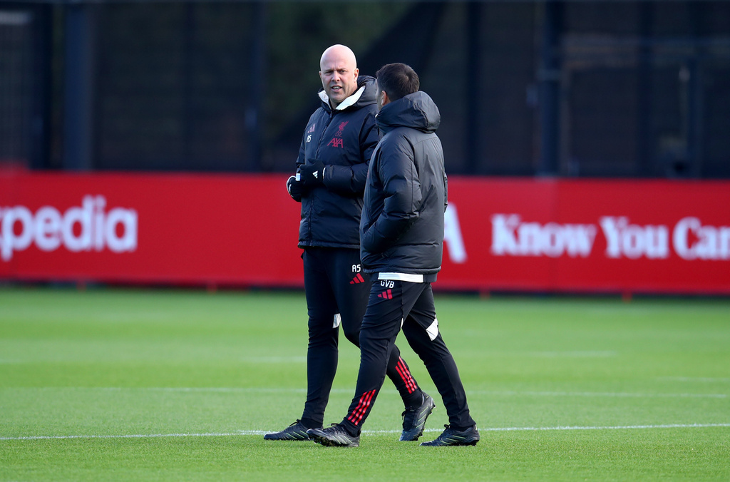 Liverpool manager Arne Slot, left, during a training session at the AXA Training Centre, Liverpool, England, Monday Dec. 8, 2025. (Tim Markland/PA via AP)