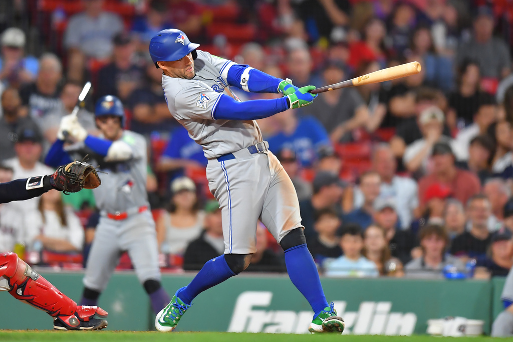 Toronto Blue Jays' George Springer hits a two-run home run in the ninth inning of a baseball game against the Boston Red Sox, Tuesday, June 16, 2026, in Boston. (AP Photo/Steven Senne)